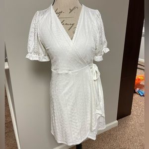 NWT. BCBGeneration. Wrap style dress off white